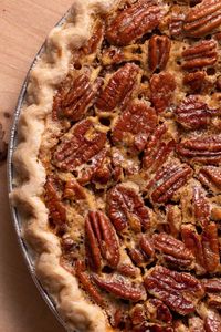 A tried and true classic, this Pecan Pie recipe is truly the best! It tastes just like the one Grandma used to make and with less than 10 ingredients, it's incredibly easy too. Perfect for both Thanksgiving and Christmas!