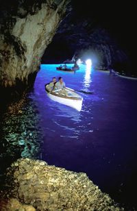 Must do: Blue Grotto in Capri, Italy. When you go to Naples, you can also go to the Pompeii ruins, or take a Ferry to Capri. Capri is not to miss. The Blue Grotto is the big tourist attraction there, and we thought it was a bit touristy. This is, however, the color or the water out in the Mediterranean. Beautiful.