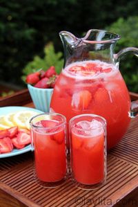 Homemade strawberry lemonade, made in the blender using lemons, strawberries and honey. No processed sugar!