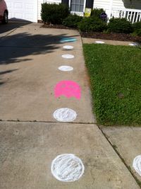 outside decor DYI- sidewalk chalk. Took no time at all to trace a bowl for the circle and free hand the ghost on the sidewalk and walk way to the front door to draw guests into the theme even before entering.