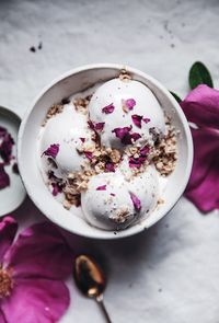 Vegan coconut + rose petal ice cream with cardamom crumble topping