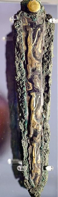 Dagger. Bronze, inlaid with silver and gold. Mycenaean Late Bronze Age, 16th century BC. National Archaeological Museum of Athens 8395.