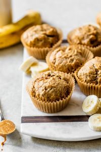 Peanut Butter Banana Muffins are proof that banana bread and peanut butter go together really well! Stuffed with extra peanut butter in the center!