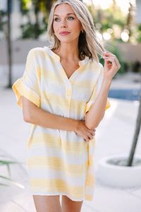 Feel confidently stylish in the Follow The Rules Yellow Striped Cover-Up. This fun tunic features chic yellow stripes and light fabric for a look that's comfortable and fashionable. Forego boring cover-ups in favor of this eye-catching cover-up! This cover-up features a v-neck, striped print, and short sleeves.  Material has no amount of stretch.Cam is wearing the small.