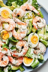 Crunchy romaine serves as the ideal vehicle for steamed shrimp, avocado, cucumbers, and hard boiled eggs with a fresh and creamy dill dressing.