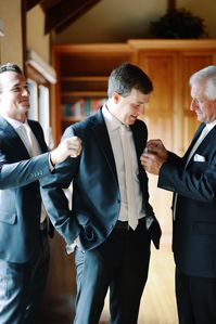 Groom Getting Ready Photos. Photographed by Lindley Battle Photography. We love it when not only the father of the groom, but the groom's future father-in-law help him get ready. These sweet photos show an intimate moment between the men before the groom walked down the aisle.