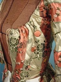 c. 1770's Polonaise of Museum Quality Floral and Striped Brocaded Silk Polonaise with Original internal Drawstrings AntiqueDress.com