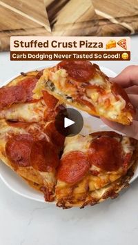 134K views · 5.8K reactions | Stuffed Crust Pizza 🧀🍕
Craving pizza without all the carbs? This stuffed crust pizza is a game-changer! 😋

What You Need:
🌮 Low-carb tortillas
🧀 Cream cheese
🍖 Sausage
🧀 Mozzarella cheese
🍅 Keto-friendly marinara sauce (e.g., from @yomamasfoods)
🍕 Pepperoni 

How to Make It:
1️⃣ Slightly crisp up two low-carb tortillas (broil for about 1 minute).
2️⃣ Spread cream cheese, sausage, and mozzarella on one tortilla.
3️⃣ Top with the second tortilla; add marinara, mozzarella, and pepperoni.
4️⃣ Bake at 400°F for 10-20 minutes, depending on how crispy you like it.

⭐ Pro Tip: If your tortillas aren't very crisp, bake closer to 15-20 minutes for that perfect crunch!

Who's ready to slice into this cheesy goodness? Drop a 🍕 in the comments if you can't wait t