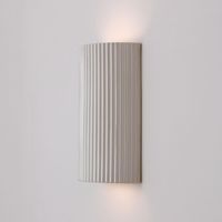 Taking inspiration from the earthy textures and glazes of mid-century studio pottery and celebrating the serene lines of falling water, we are proud to introduce our newest line The Tumwater Collection featuring locally hand cast opaque stoneware. Our new low profile sconce cast lovely ambient light and meets the Ameri