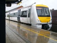 c2c class 357006 with the National Express livery at West Ham Station for London Fenchurch Street