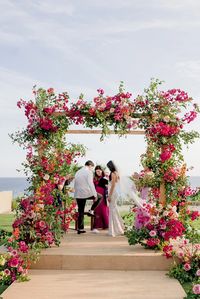 This colorful Cabo wedding is giving us boho Barbie vibes!