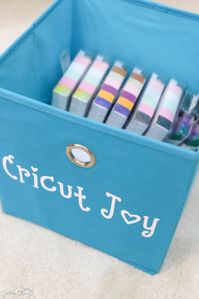 This super simple home organization hack uses regular vinyl as fabric storage bin labels! #cricut #cricutmade #homeorganizationhacks