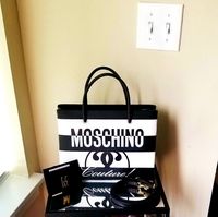 Nwt,Never Worn,Mint Condition,Authentic Moschino Women's Tote/Crossbody & Wallet,100%Genuine Leather,Front Logo,1 Inside Zipper Pocket,2 Inside Slots,2 Front Slots,& 2 Back Slots For Wallet,Originally $1650,Selling For $850,Final!! Offer : )