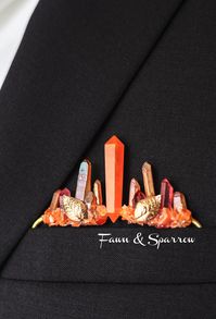 Striking Groom's Pocket Boutonniere features genuine crystal gems! A breathtaking addition to autumn themed weddings and events. The orange and red hues capture the rich and warm tones of the fall season. This style slides effortlessly into the suit pocket. No pinning or additional materials require