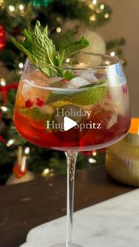 Danica Frye on Instagram: "Send this to the spritz lover in your life 🫶🏼

If you’ve never had a Hugo Spritz, now’s the time to change that because the Hugo Spritz is truly a masterpiece. And this holiday version is incredible — the pomegranate and elderflower are so perfect together! You’ll want to have this on your table for any holiday celebration this year ✨

Comment GLASS and I’ll dm you the link to everything I used here, including the ice tray I used. 

INGREDIENTS:
2 oz elderflower liqueur
2 oz pomegranate juice
1 oz club soda
6-8 mint leaves
4 oz Prosecco (or more— measure with your heart 🤭)

METHOD:
Add fresh mint and elderflower liqueur to a wine glass. Gently muddle. 
Add ice. Then add pomegranate juice and soda water. Give it a stir, then top with Prosecco.
Garnish with pome