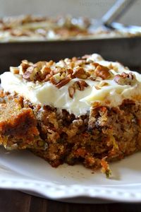 This truly is the BEST EVER Carrot Cake! Moist, fluffy, tender spiced cake filled with juicy pineapple, crunchy pecans, fresh carrots and aromatic spices, topped with an orange-spiked cream cheese icing. So perfect, a total crowd-pleasing, impressive cake!