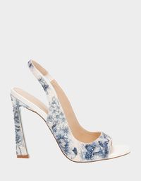 Meet MINA: a head-turning slingback with a unique, blooming heel that’ll make you stand out from the crowd. For a sizzling style that's sure to be a show-stopper, slip on MINA's floral print heels and strike a pose! Satin upper material with stones Synthetic lining/sock Betsey Blue synthetic sole 4.25 inch heel height Imported