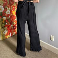 These Beyond Words Pleated Trouser Pants Are Brand New With Tags Attached. Wide Pleated Legs With Lots Of Stretch. High Waisted With Back Elastic Band And Front Flat Band. Ruffled Hem. Size L. Fits Like An 8/10 Us Apparel Measurements: Length: 43" Inseam: 29" Waist: 29" Imperfections: There Are No Visible Imperfections My Measurements: Height: 5'10 Waist: 30" Bust: 37" Hips: 35"