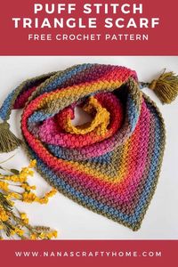 A puff stitch crochet scarf is a free crochet pattern by Nana's Crafty Home! This triangle scarf blends cozy warmth with a dash of bohemian flair, making it your perfect accessory for fall and winter. Whether you're a crochet newbie or a seasoned expert, this pattern will inspire your creativity. Pair it with jeans for a casual look or a maxi dress for boho vibes.