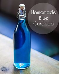 Made with a combination of vodka, gin, bitter orange peel and cloves, the from-scratch liqueur steeps for about 20 days before it's tinted and put to use in vibrant cocktails. Try it and make your own delicious blue curaçao!