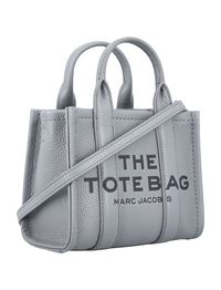 Grained Leather The Mini Tote Bag By Marc Jacobs. Featuring: Round Top Handles Zip Closure Removable Leather Strap Debossed Signature Logo Main Compartment Height: 15 Cm Width: 18 Cm Height: 10 CmComposition: 100% cow leather