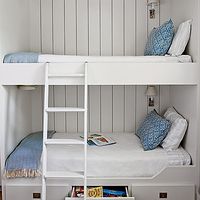 Borrowing cues from life aboard a ship, the designers of this Galveston Bay, Texas, home maximized sleeping space in the boys' bedroom by constructing custom bunk beds. | Coastalliving.com