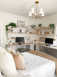 Sharing our multi-purpose home office guest room design that accommodates a shared home office for two with a sofa bed and a workout space. How to design a multi-purpose guest room. Office guest room layout ideas. Ikea Alex Desk Hack.