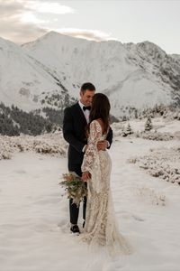 This sunrise elopement was absolutely gorgeous atop Loveland Pass. We weren't expecting snow, but it was perfect for the newlyweds who love the mountains so much.