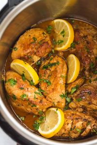 Lemon garlic chicken, and lemon slices in the Instant Pot