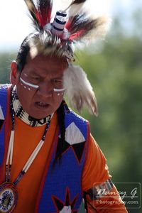 A Native American Indian man dancing in a fancy outfit at a Pow Wow at the Milwaukee Lakefront Indian Summer Festival, Wisconsin