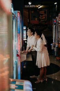 Wynda & Arief, - they know how to have fun during the session at Game Master, Cihampelas Walk, Bandung. They seemed to forget that it is a photoshoot, and they really enjoy playing with almost all the arcade games. This session was meant for them, the white dress was just on point.