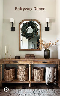 Maximize your entryway space with a small hallway table, curved mirror & decor that blends style and practicality. P.S. Use woven baskets that double as accents & organizers.