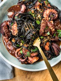 Braised Polipetti (baby octopus) with Squid Ink Chitarra (pasta) - WILD GREENS & SARDINES