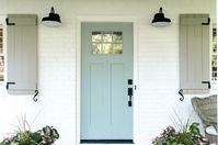 simply white BM for the painted brick, rock port grey BM for the shutters, and dutch tile blue SW for the door!