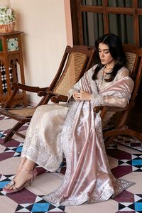 Color: Rose Pink PRODUCT DETAILS LEILA is crafted from pure almond zari net encrusted with delicate hand embellishments to create a classy and elegant ensemble. A pearl embellished pastel rose pink zari tissue dupatta completes the final look of this design.