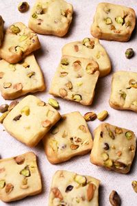 These Pistachio Shortbread Cookies are made with 5 ingredients only! They are buttery, tender, snappy, and loaded with pistachios.