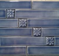 blue flowers with skinny subway tiles