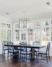 Dark Stained Dining Table with Blue Bamboo Dining Chairs