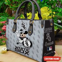 Custom Name MLB Chicago White Sox Mickey Women Leather Hand Bag Introducing our Women’s Handbag, the epitome of sophistication and versatility. Crafted with premium materials and exquisite attention to detail, it offers both style and functionality. With spacious compartments and elegant design, our handbag seamlessly transitions from day to night, adding a chic touch to any outfit. Elevate your accessory game with our Women’s Handbag, where fashion meets practicality in every stitch. Product de