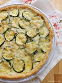 Zucchini Pie! A savory pie or tart recipe made with zucchini, mozzarella cheese and Italian herbs baked in a crescent roll crust.