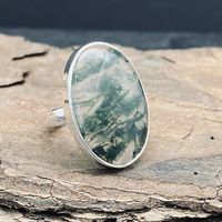 This sterling silver  moss agate ring is a size 6. The stone and setting at the top measure 25mm in length and 18mm wide. ♥ Love ♥ Abundance ♥ Wealth ♥ Good luck ♥ Longevity ♥ Acceptance ♥ Courage and strength ♥ Protection, security and safety ♥ Balance ♥ Harmony ♥ Generosity ♥ Appreciation of nature