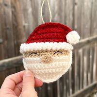 "Kid-friendly ornaments can be hard to come by, so why not make your own?! This crochet pattern will teach you how to make your own adorable kid-friendly Santa Claus ornament! It won't smash on the floor, have pieces a child can choke on, or have any sharp edges. But it's still so cute! The pattern is written in US crochet terminology and the finished dimensions are 3.5\"/8.9 cm tall. This 10 page printable PDF pattern has detailed instructions and over 60 photos to help you create your very own