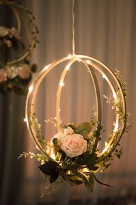 Unique Design: Handcrafted with blush and ivory open roses, rose buds, greeneries and vines on a bentwood spheres and a orbit hoop. They look realistic and will last forever. Package & Size: Set of 2 floral hoop wreaths. The floral hoops are 12" diameter. Natural twine cords atteached, ready for hanging. From a lar