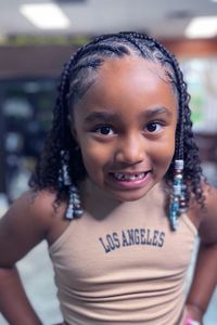 Cute Hairstyles for Black Girls are the most dynamic and volatile hairstyles. Among the hairstyles used by African American black people, the kids’ hairstyles are of a significant number. Almost all categories of hairstyles of the adults of the black people of African American ethnicity are also used for styling the black kids. But the cornrows, beads, ponytails, ribbons, Bantu knots, puffy braids, and topknots are the most popular forms of hairstyles for black kids. #kidshairstyles