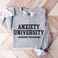 Anxiety University Honors Program Sweatshirt - Mental health crewneck in college font design. Hoping for a T-SHIRT?  Wish I had a different COLOR or SIZE?  Please ask!  I will do my best to accommodate! About Our Sweatshirts Ideal for any situation, this premium and soft Unisex sweatshirt fits like a well loved favorite.    .: Ribbed knit collar retains its shape even after washing  .: No itchy side seams  .: 50% Cotton 50% Polyester - A perfect blend for smooth printing .: Medium-heavy fabric