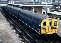 501 class EMUS formally worked the North London line, now London Overground. They had bars on the drop down windows because of restricted clearances in Hampstead heath tunnel, a feature which earned them the nickname 'Jail Trains'