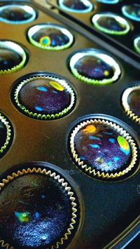 Galaxy cupcakes!!! These make me want to leave the frosting OFF, or fill the from the bottom...