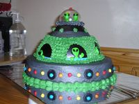 Alien Ship All in BC and fondant aliens. The cake was vanilla flavor with green food coloring.