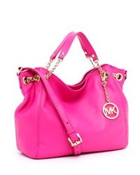 This needs to be my next bag! Bright fuchsia will light up the look any day. One can never have too many bags ya know:) They are the perfect accessory. Kembrel has plenty more to choose from if you take a peek:)