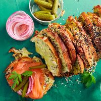 Want to impress at your next picnic? This cheat's everything-bagel pull-apart will deliver. Toasted cheese and chive slices with smoked salmon, cornichons and pickled onion make a delightful bite.